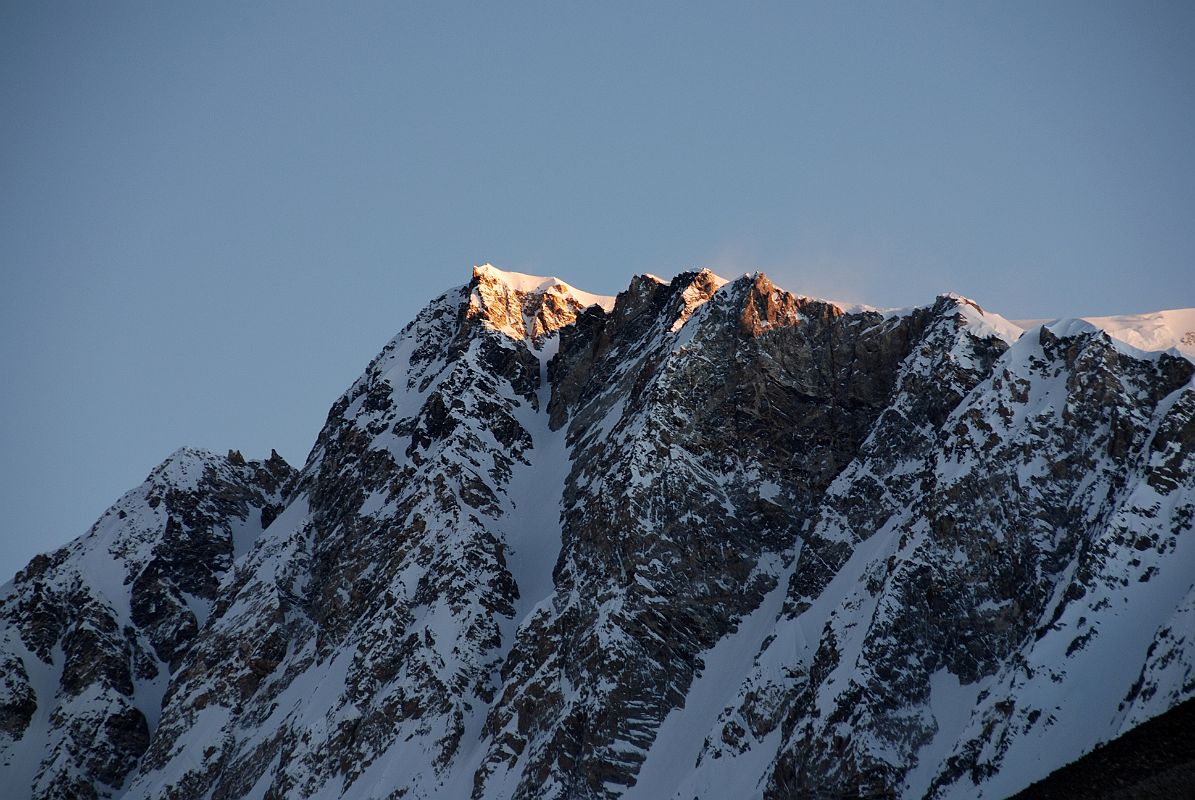 40 First Rays Of Sunrise On Shishapangma Southwest Face From Advanced Base Camp The first rays of sunrise on Shishapangma Southwest Face from Advanced Base Camp.